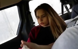 Enchanting young ex-girlfriend deeply gulfing penis in car